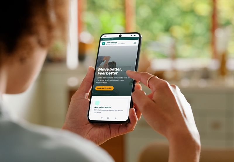 A person browsing a sample chiropractic practice website on a phone